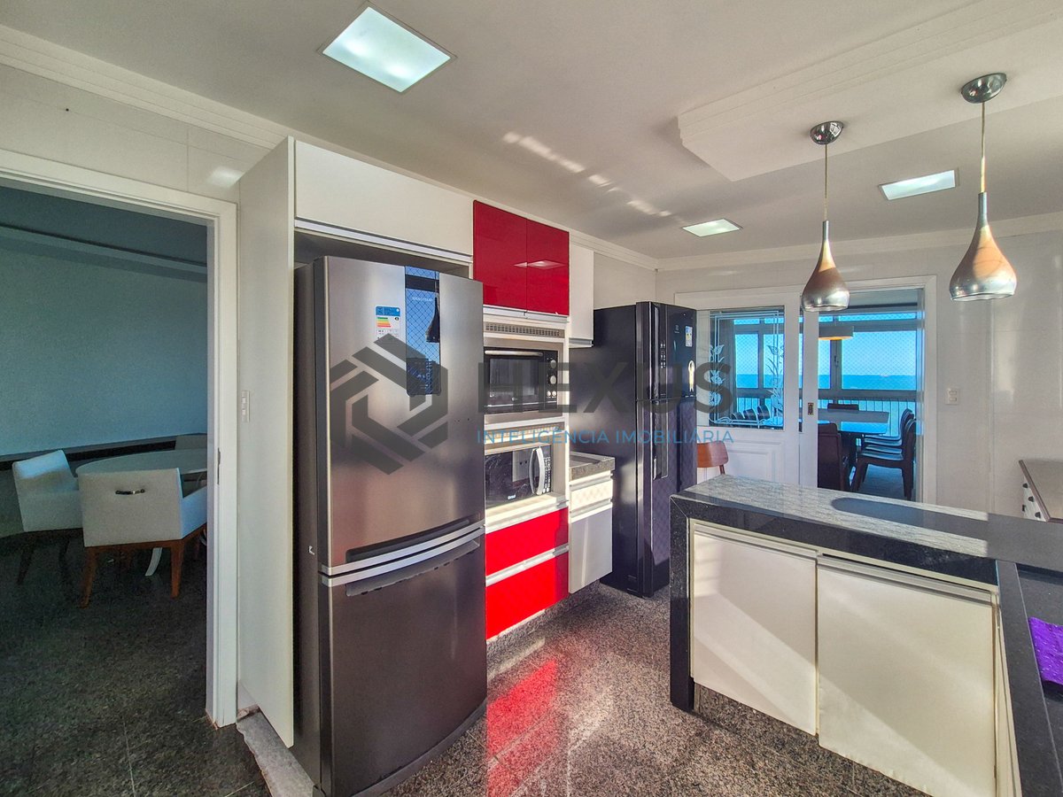Foto 43 de Apartamento frente mar reformado com varanda na Praia das Pitangueiras, Guaruja
