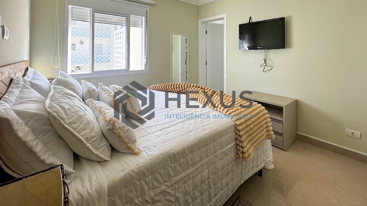 Foto 17 de Apartamento reformado frente mar com varanda na Praia das Pitangueiras, Guaruja