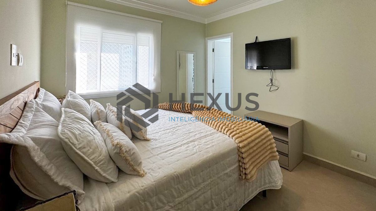 Foto 18 de Apartamento reformado frente mar com varanda na Praia das Pitangueiras, Guaruja