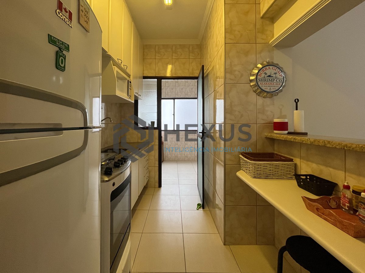 Foto 18 de Apartamento beira mar com varanda e lazer na Praia da Enseada, Guaruja