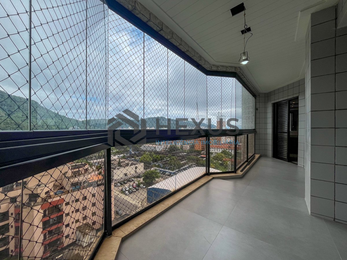 Foto 2 de Apartamento reformado beira mar com varanda e lazer na Praia da Enseada, Guaruja