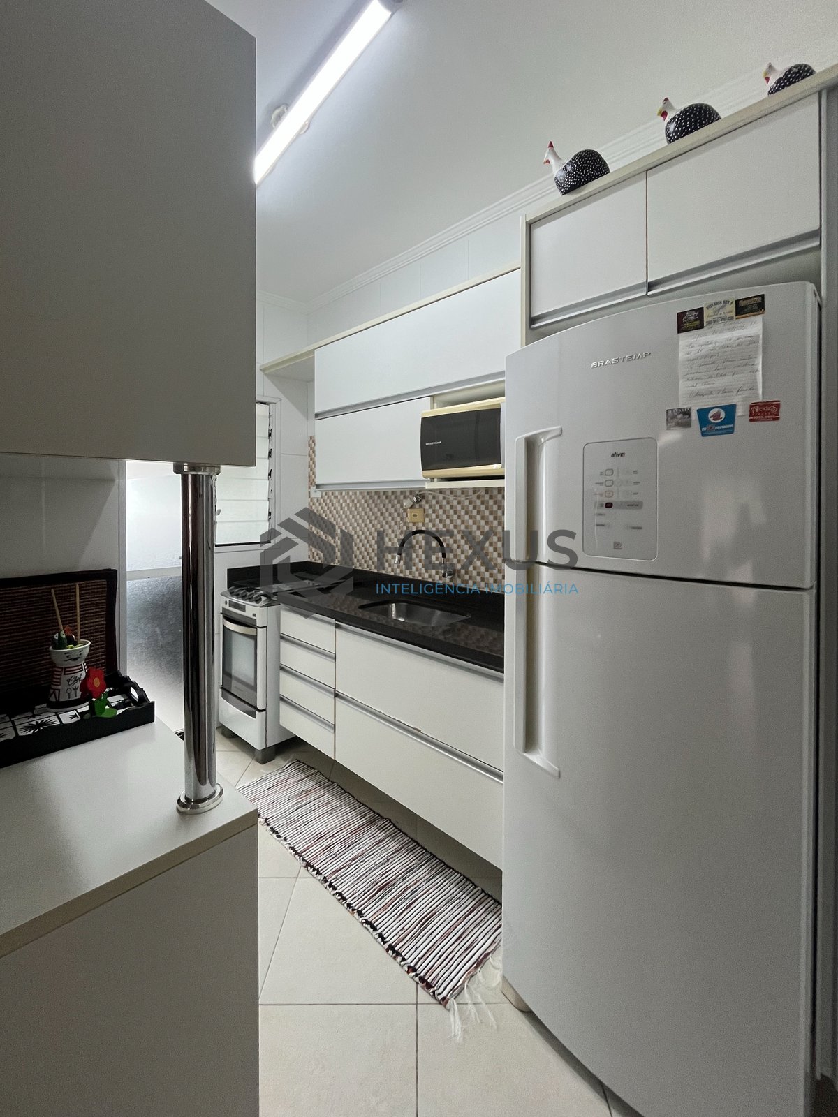 Foto 15 de Apartamento beira mar com varanda e lazer na Praia da Enseada, Guaruja