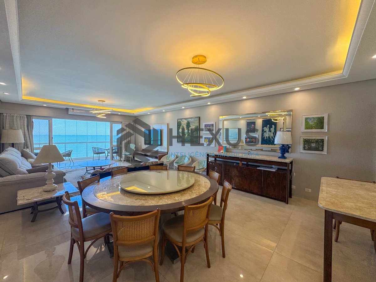 Foto 6 de Apartamento reformado frente mar com varanda na Praia das Pitangueiras, Guarujá