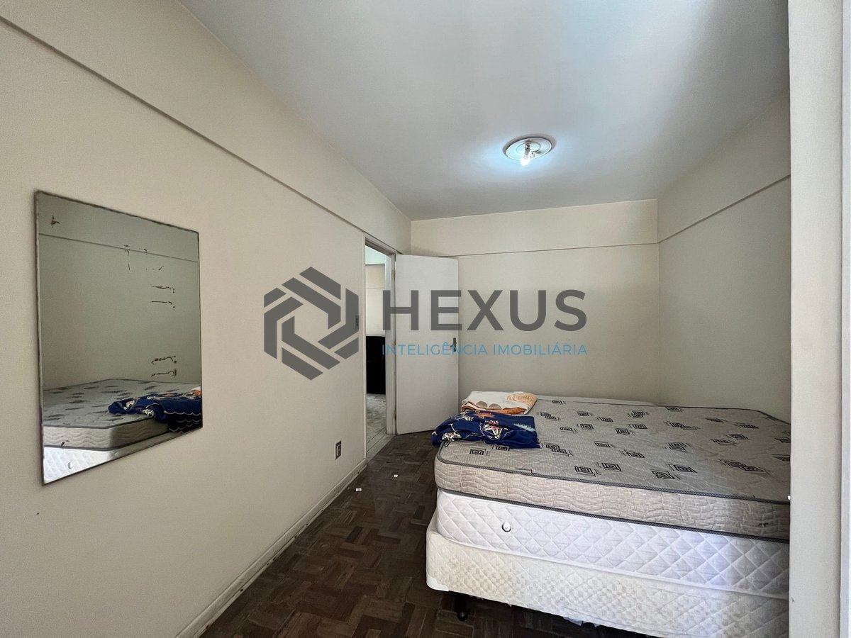 Foto 12 de Apartamento frente rua com varanda e vista livre na Praia das Pitangueiras, Guaruja