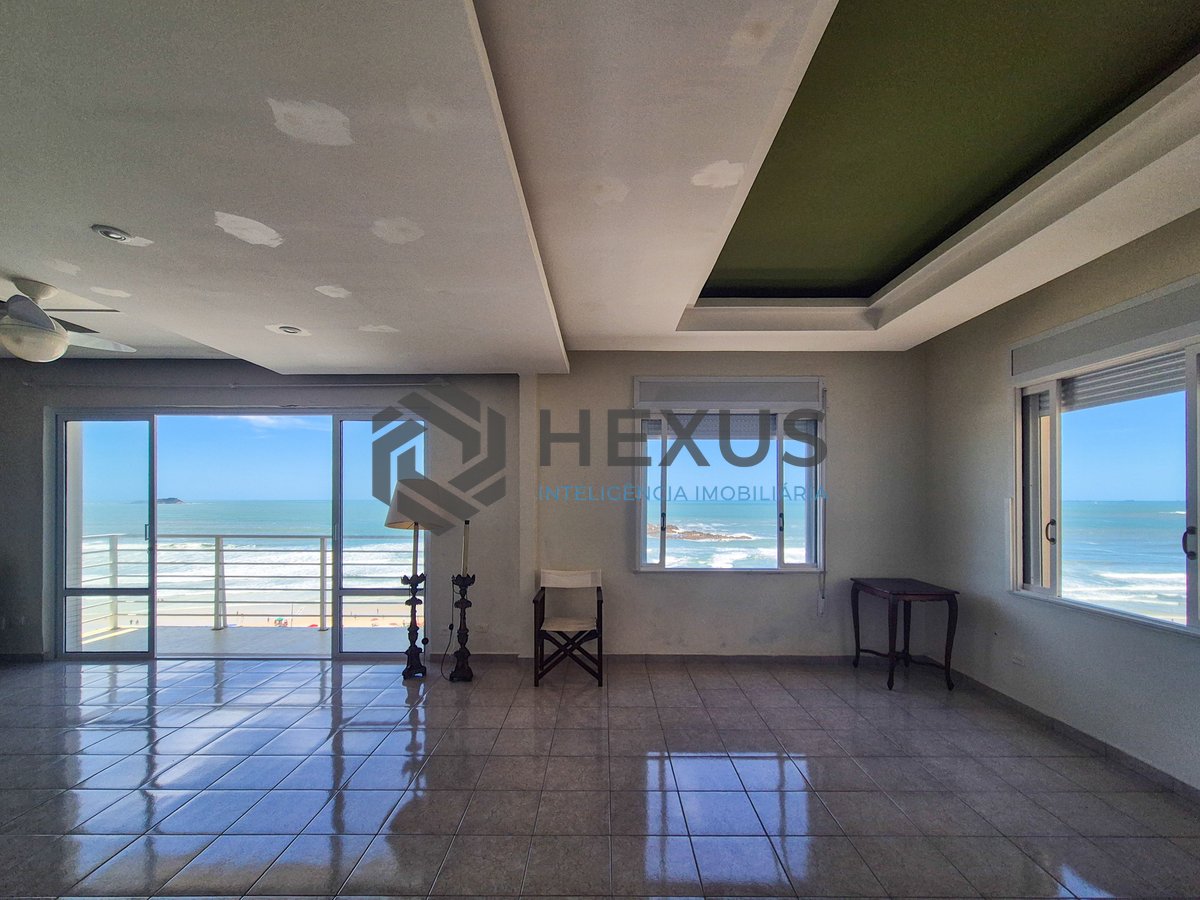 Foto 6 de Apartamento frente mar reformado com varanda e lazer na Praia das Pitangueiras, Guaruja