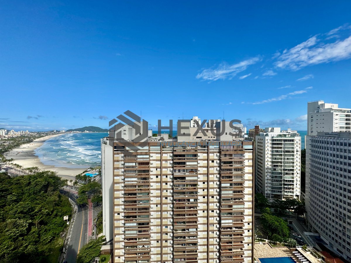 Foto 11 de Apartamento beira mar reformado com varanda e lazer na Praia das Pitangueiras, Guaruja
