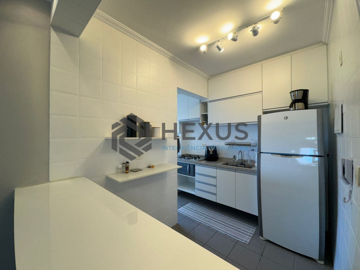 Foto 11 de Apartamento reformado com varanda gourmet na Praia da Enseada, Guaruja