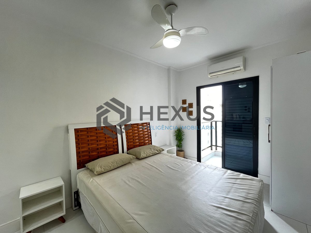 Foto 12 de Apartamento reformado com varanda e lazer na Praia das Pitangueiras, Guaruja