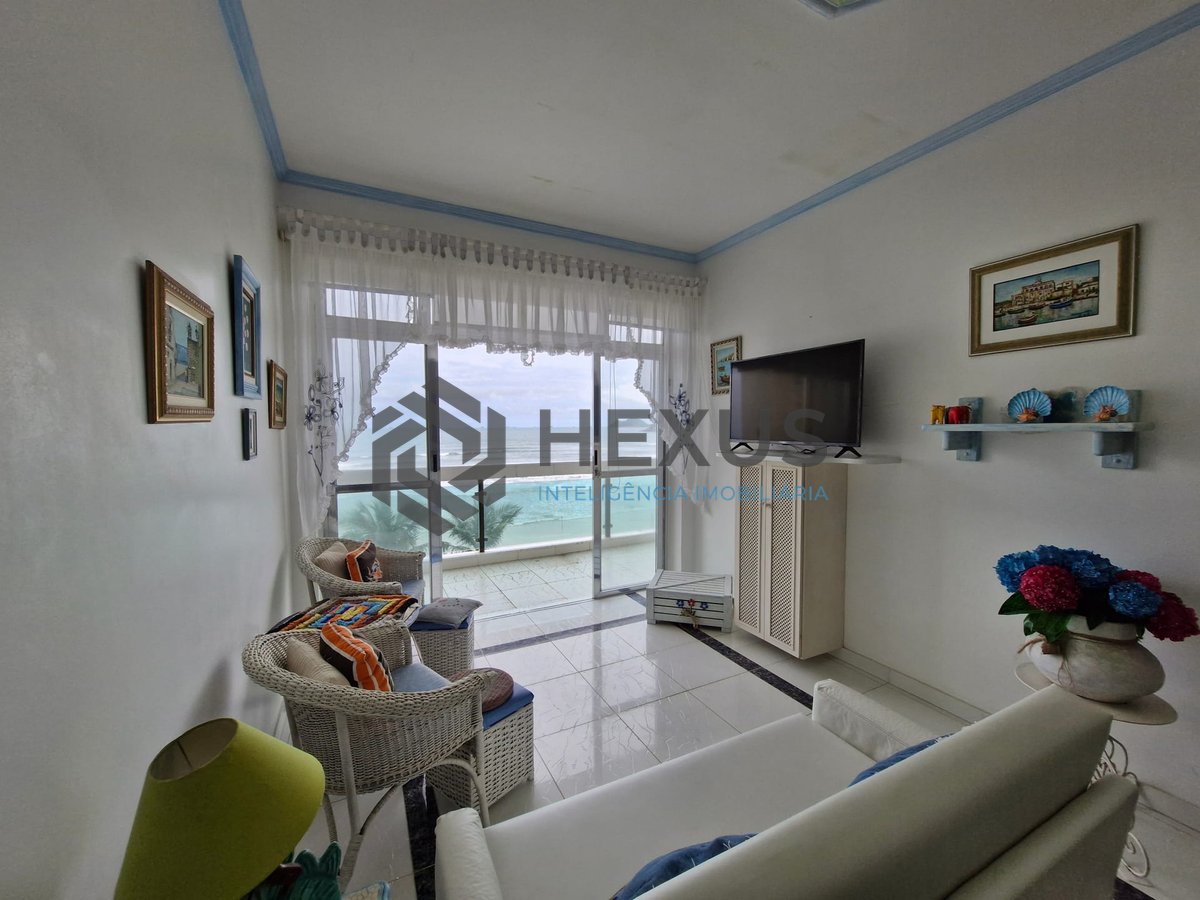 Foto 3 de Apartamento reformado frente mar com varanda na Praia das Pitangueiras, Guaruja