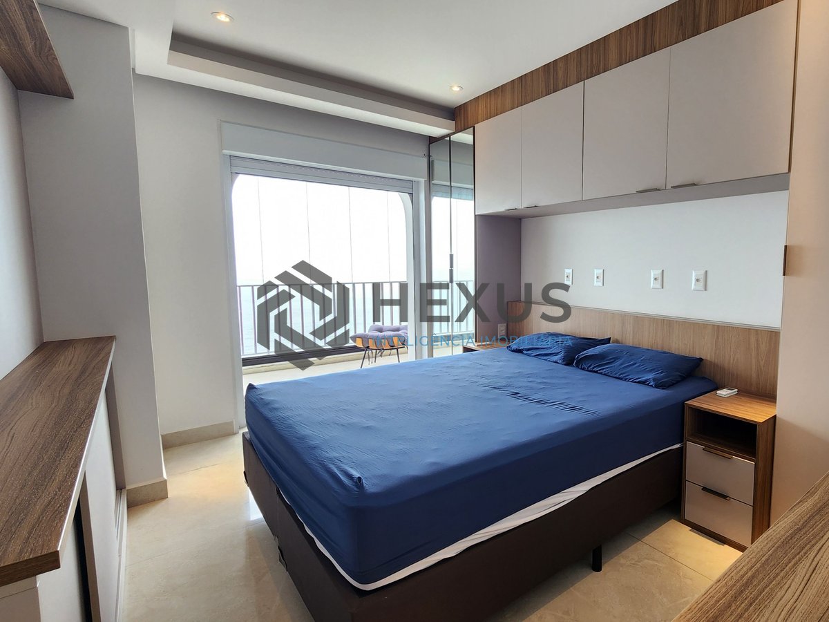 Foto 14 de Apartamento reformado frente mar com varanda e lazer na Praia das Asturias, Guaruja