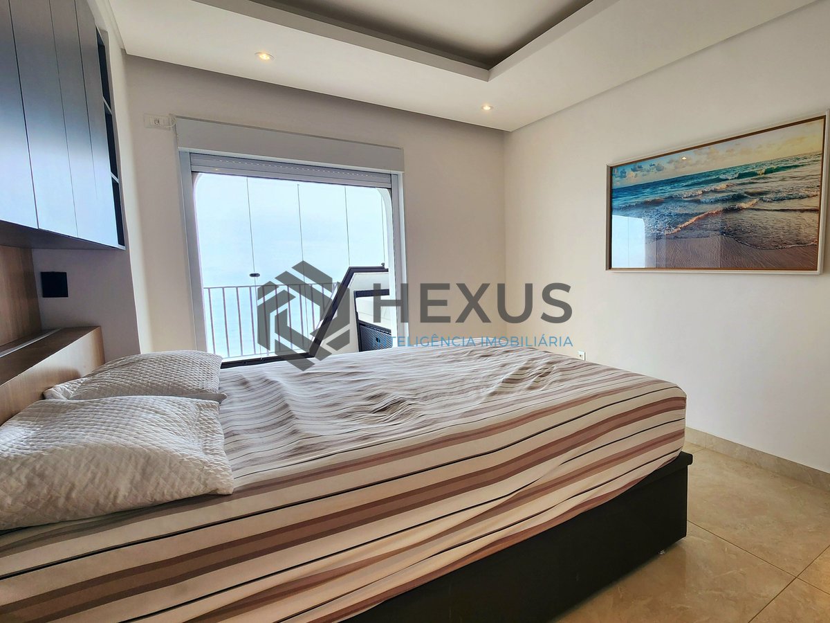 Foto 8 de Apartamento reformado frente mar com varanda e lazer na Praia das Asturias, Guaruja