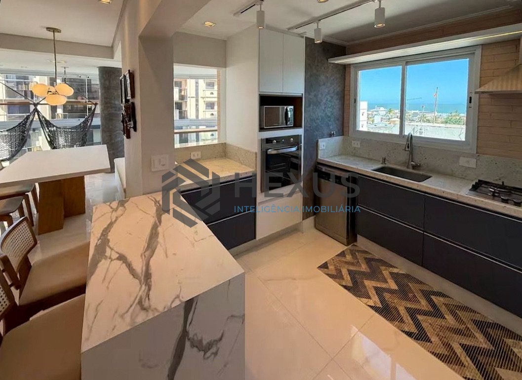 Foto 17 de Apartamento reformado com varanda gourmet e lazer na Praia da Enseada, Guaruja