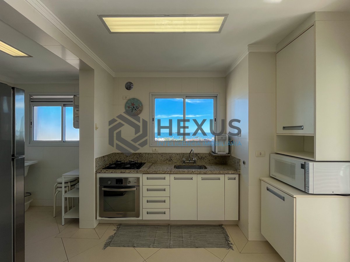 Foto 17 de Apartamento com varanda gourmet e lazer na região da Brunella na Praia da Enseada, Guaruja
