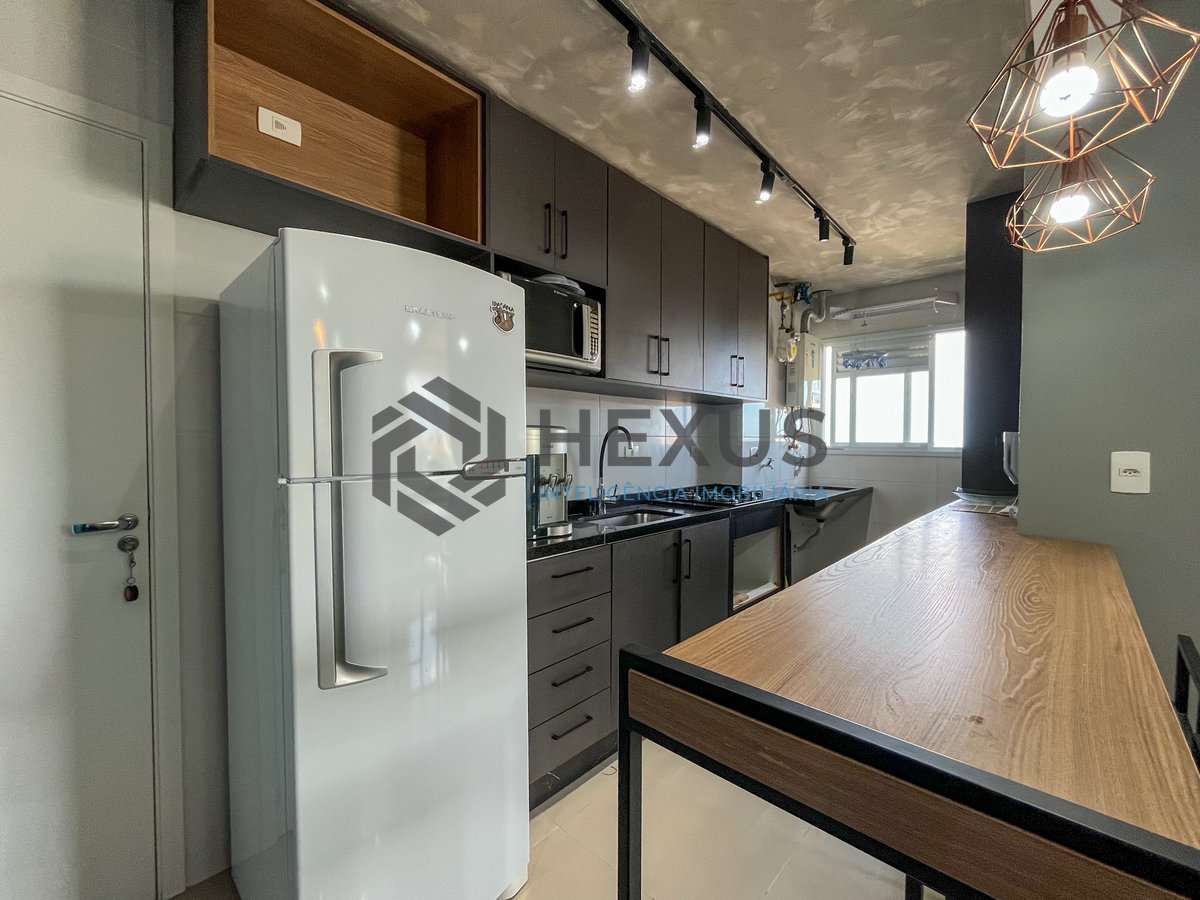 Foto 12 de Apartamento com varanda gourmet e lazer em prédio novo na Praia das Pitangueiras, Guaruja