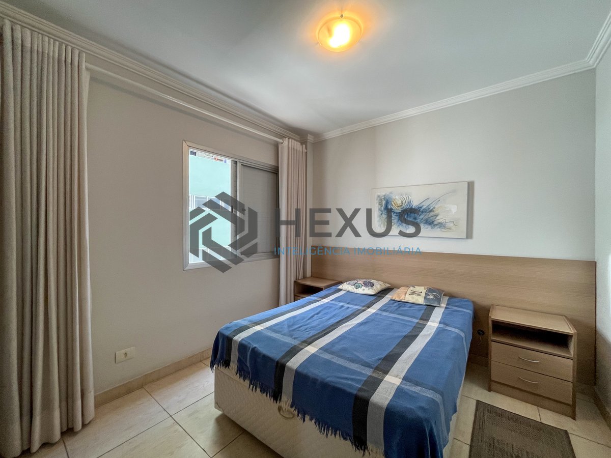 Foto 11 de Apartamento com varanda na região da Vila Alzira na Praia das Asturias, Guaruja