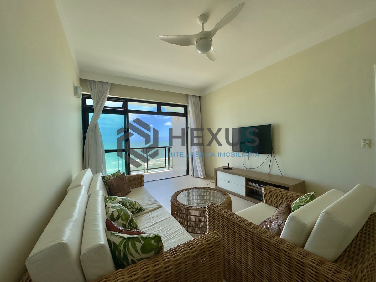 Foto 12 de Apartamento frente mar reformado com varanda e lazer na Praia das Pitangueiras, Guaruja