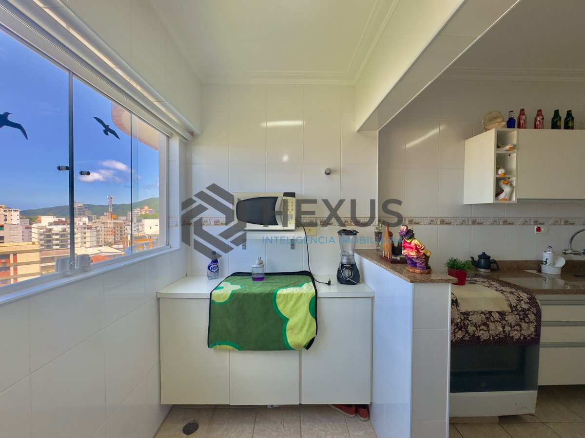 Foto 19 de Apartamento reformado com varanda e lazer na Praia das Asturias, Guaruja