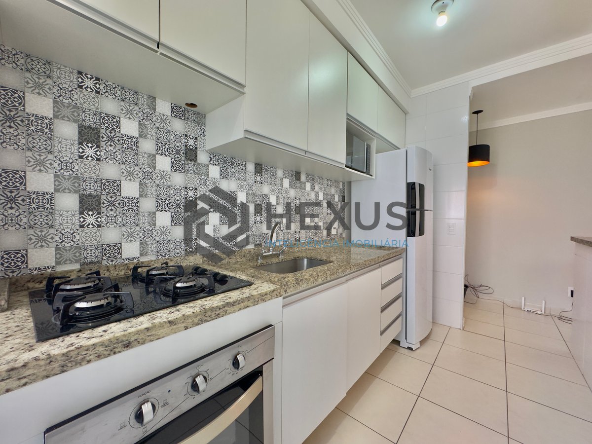 Foto 16 de Apartamento reformado com varanda e lazer na Praia da Enseada, Guaruja