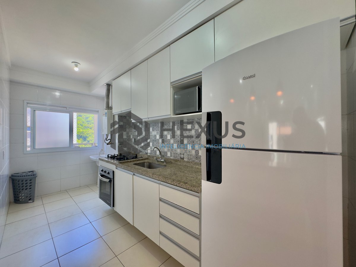 Foto 18 de Apartamento reformado com varanda e lazer na Praia da Enseada, Guaruja