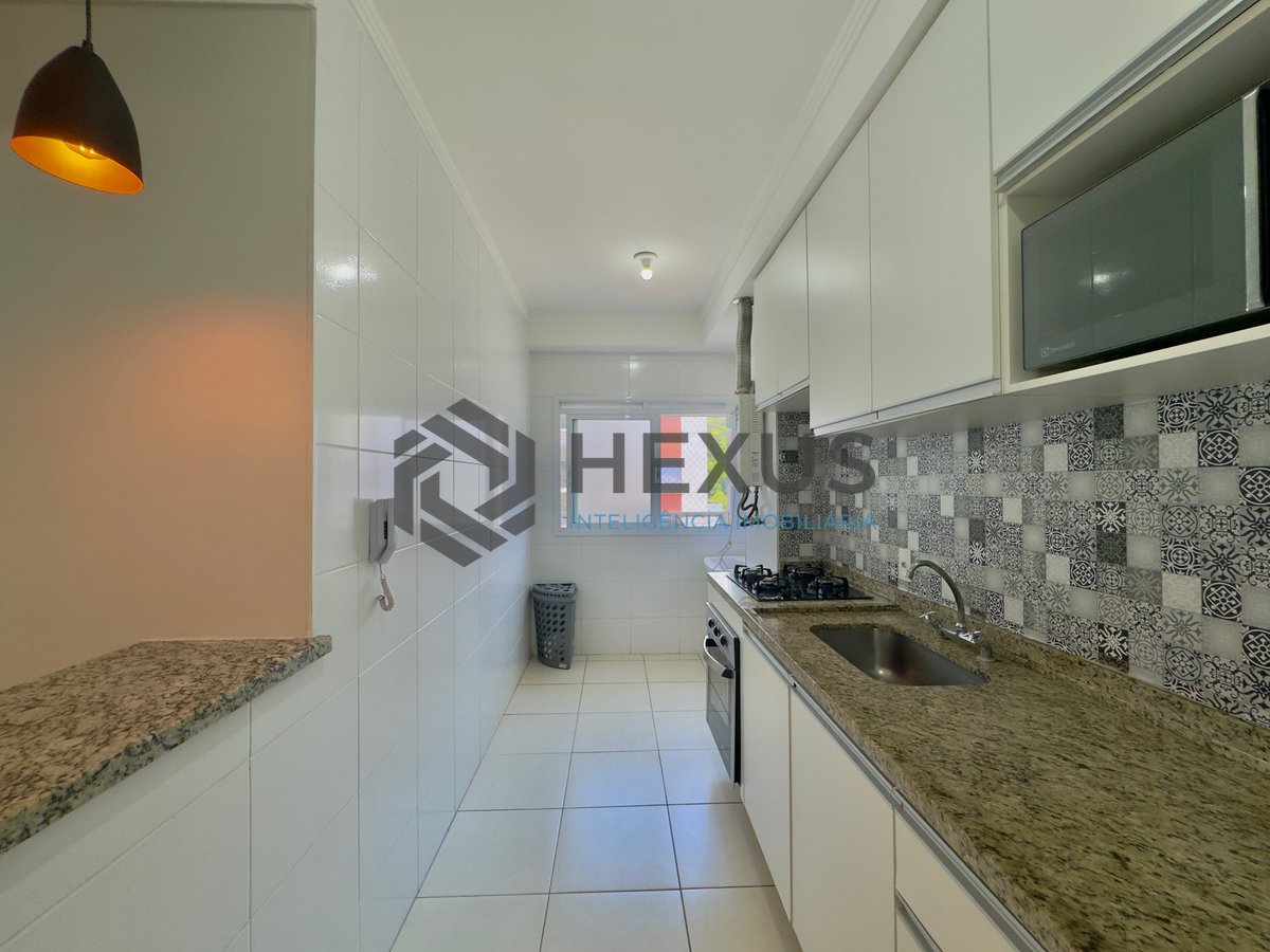 Foto 19 de Apartamento reformado com varanda e lazer na Praia da Enseada, Guaruja