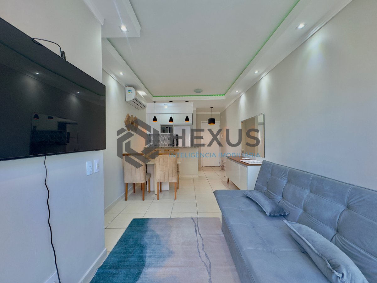 Foto 4 de Apartamento reformado com varanda e lazer na Praia da Enseada, Guaruja