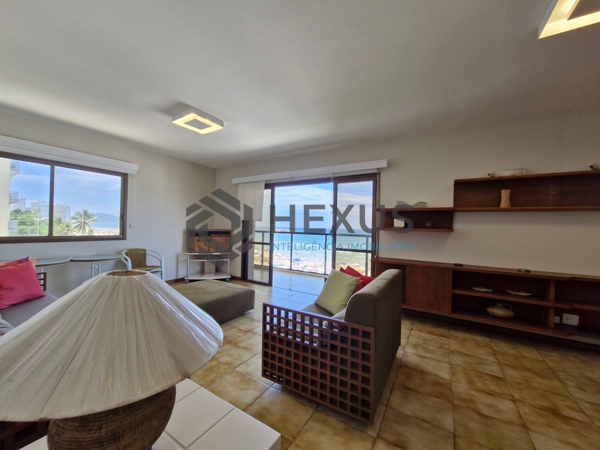 Foto 5 de Apartamento reformado frente mar com varanda e lazer na Praia das Pitangueiras, Guaruja
