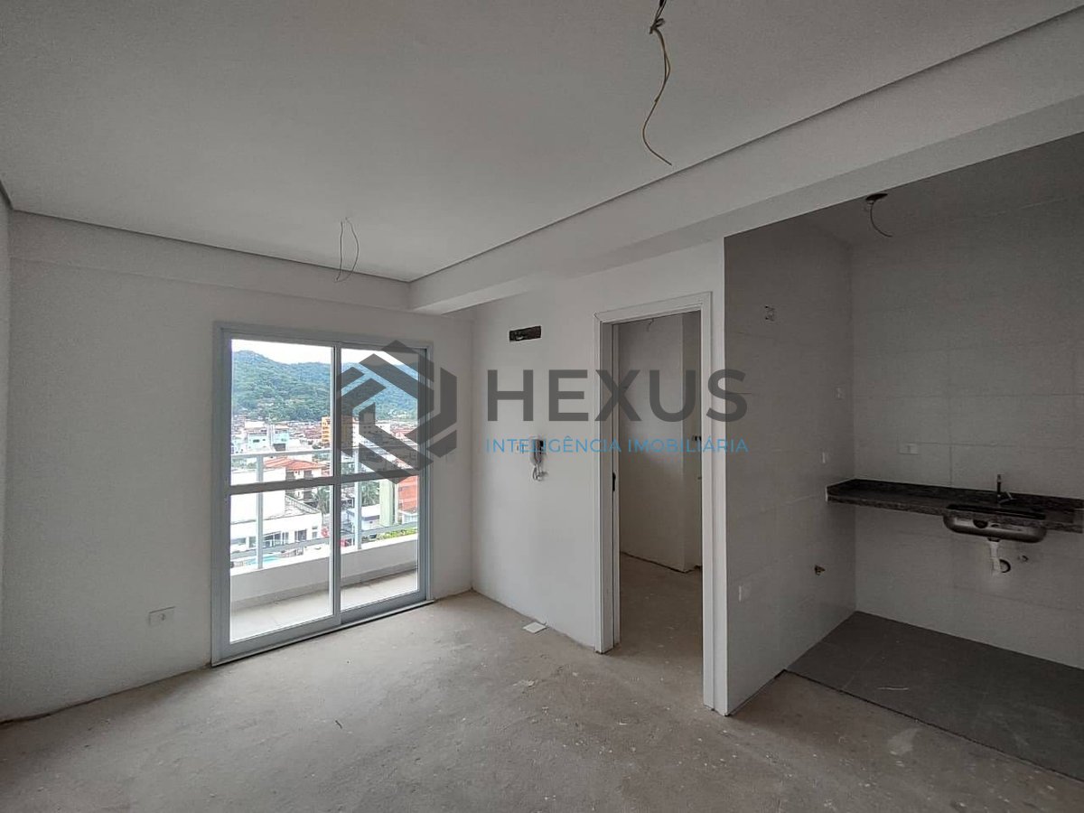 Foto 3 de Apartamento com varanda e lazer na Praia da Enseada, Guaruja