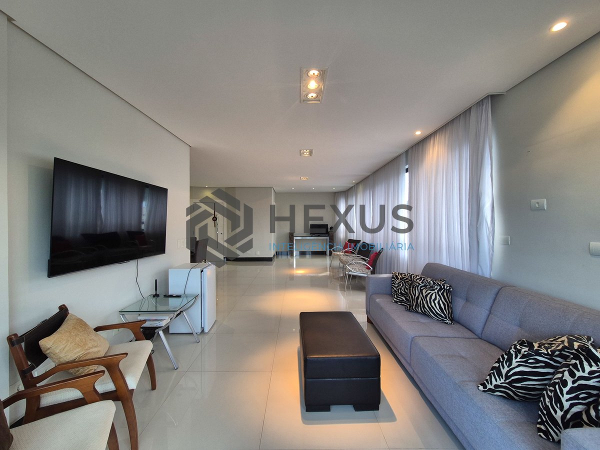 Foto 5 de Apartamento reformado com varanda e lazer na Praia das Pitangueiras, Guarujá