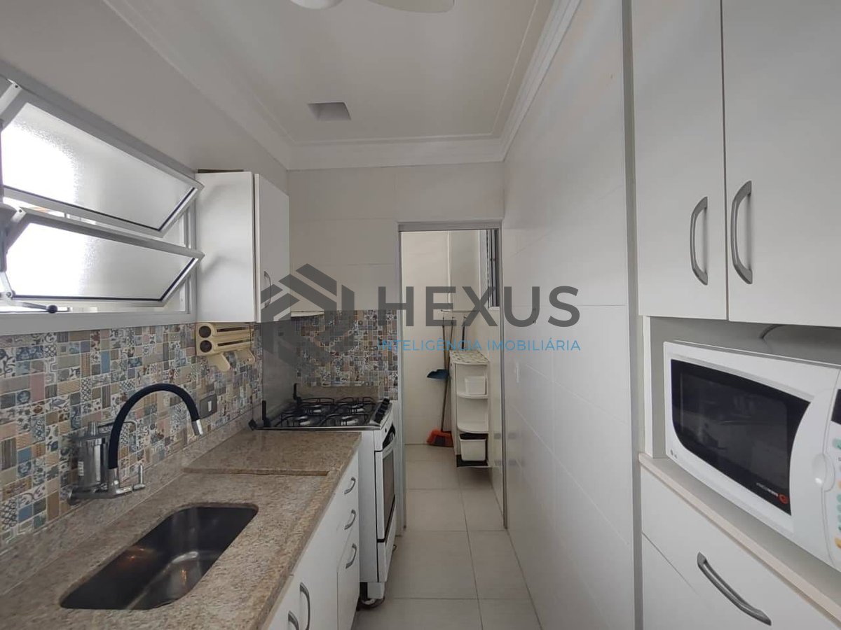 Foto 15 de Apartamento reformado com varanda e lazer na Praia da Enseada, Guaruja