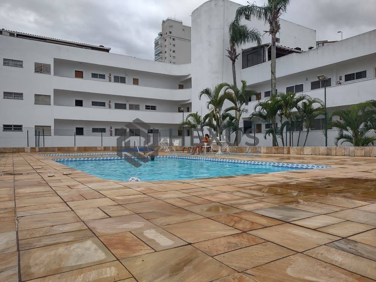 Foto 17 de Apartamento reformado com varanda e lazer na Praia da Enseada, Guaruja