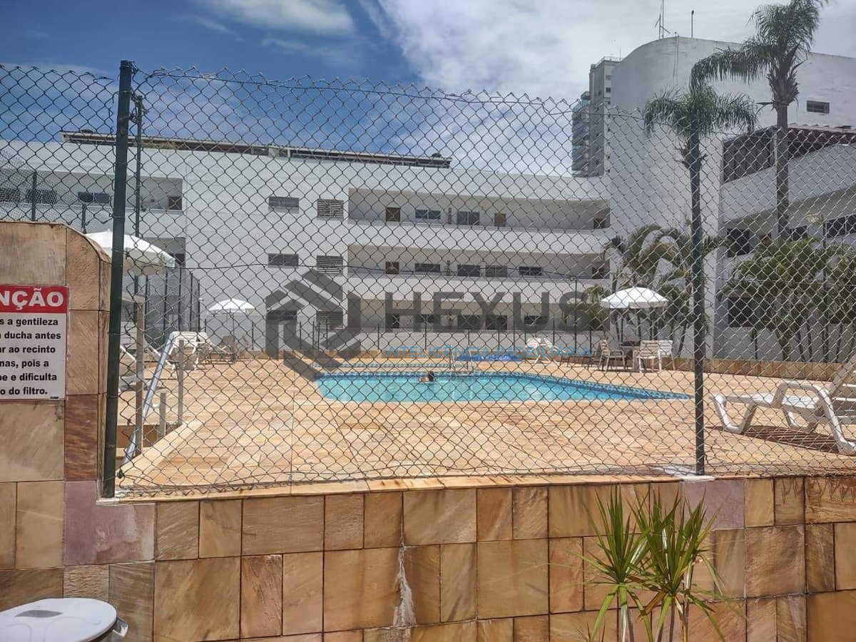 Foto 15 de Apartamento reformado com varanda e lazer na Praia da Enseada, Guaruja