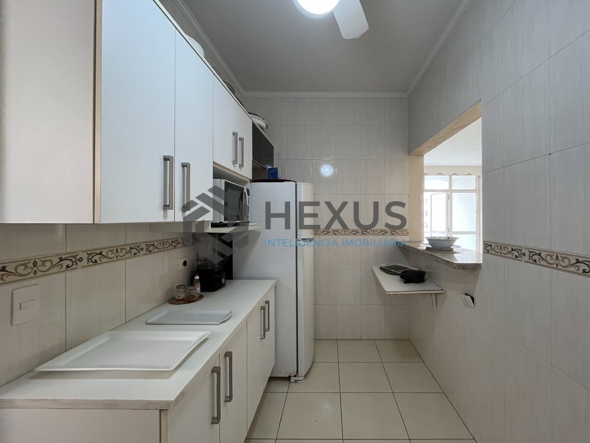 Foto 11 de Apartamento com varanda vista mar na beira mar da Praia das Pitangueiras, Guarujá