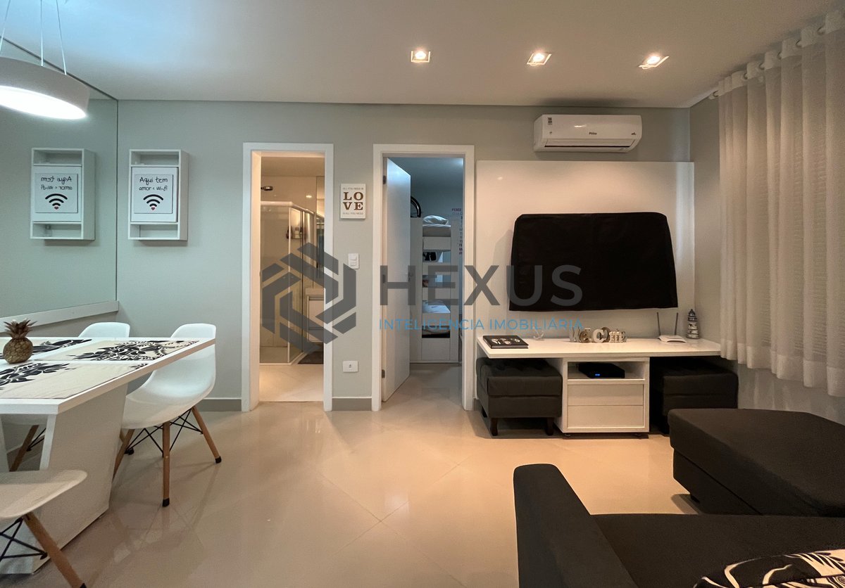 Foto 2 de Apartamento reformado com varanda gourmet e lazer na Praia das Pitangueiras, Guaruja