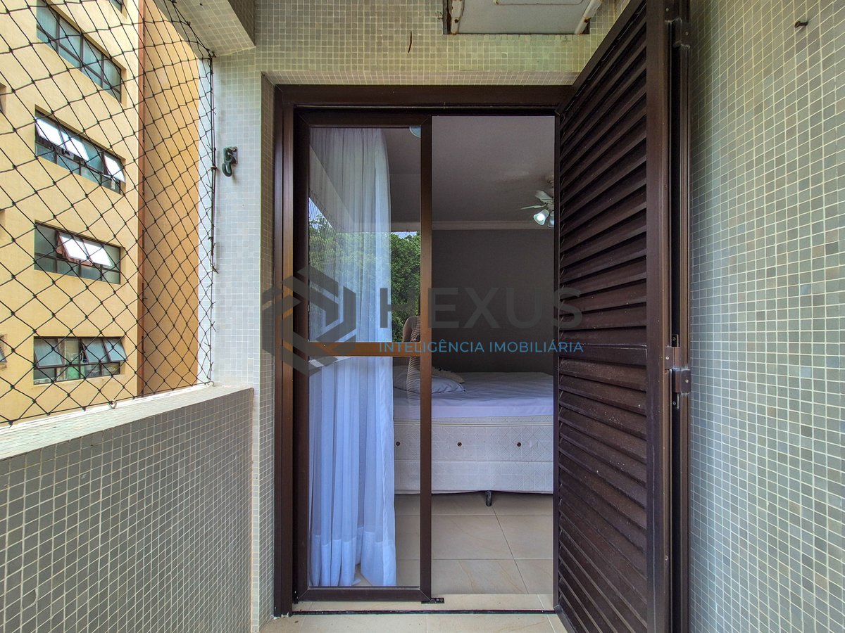 Foto 18 de Apartamento com varanda e lazer na região da Barra Funda da Praia das Pitangueiras, Guarujá