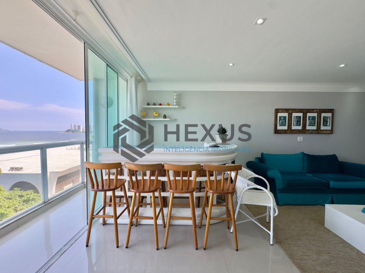 Foto 6 de Apartamento reformado frente mar com varanda vista mar na Praia das Pitangueiras, Guaruja