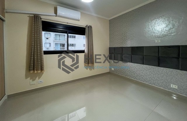 Foto 11 de Apartamento com varanda e lazer na Praia das Pitangueiras, Guaruja