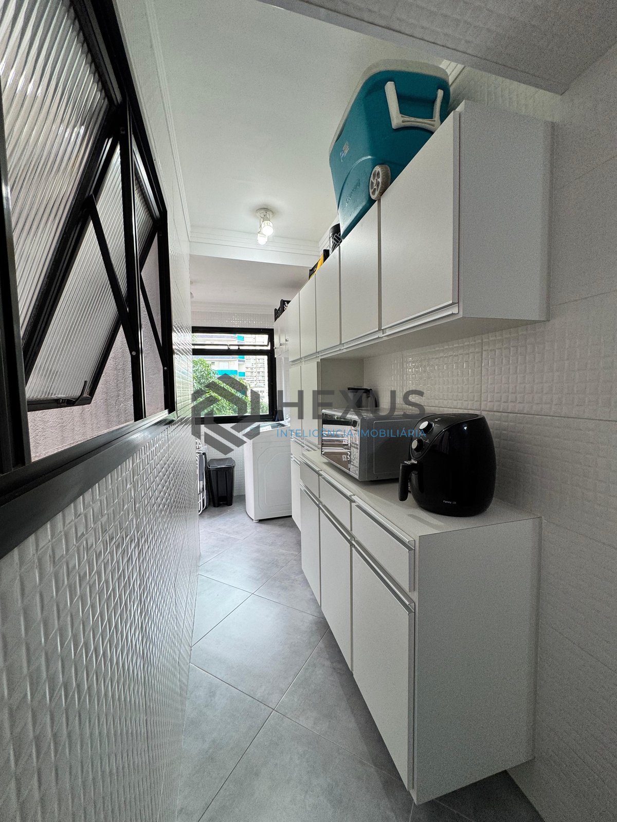 Foto 20 de Apartamento reformado com varanda na Praia das Astúrias, Guarujá