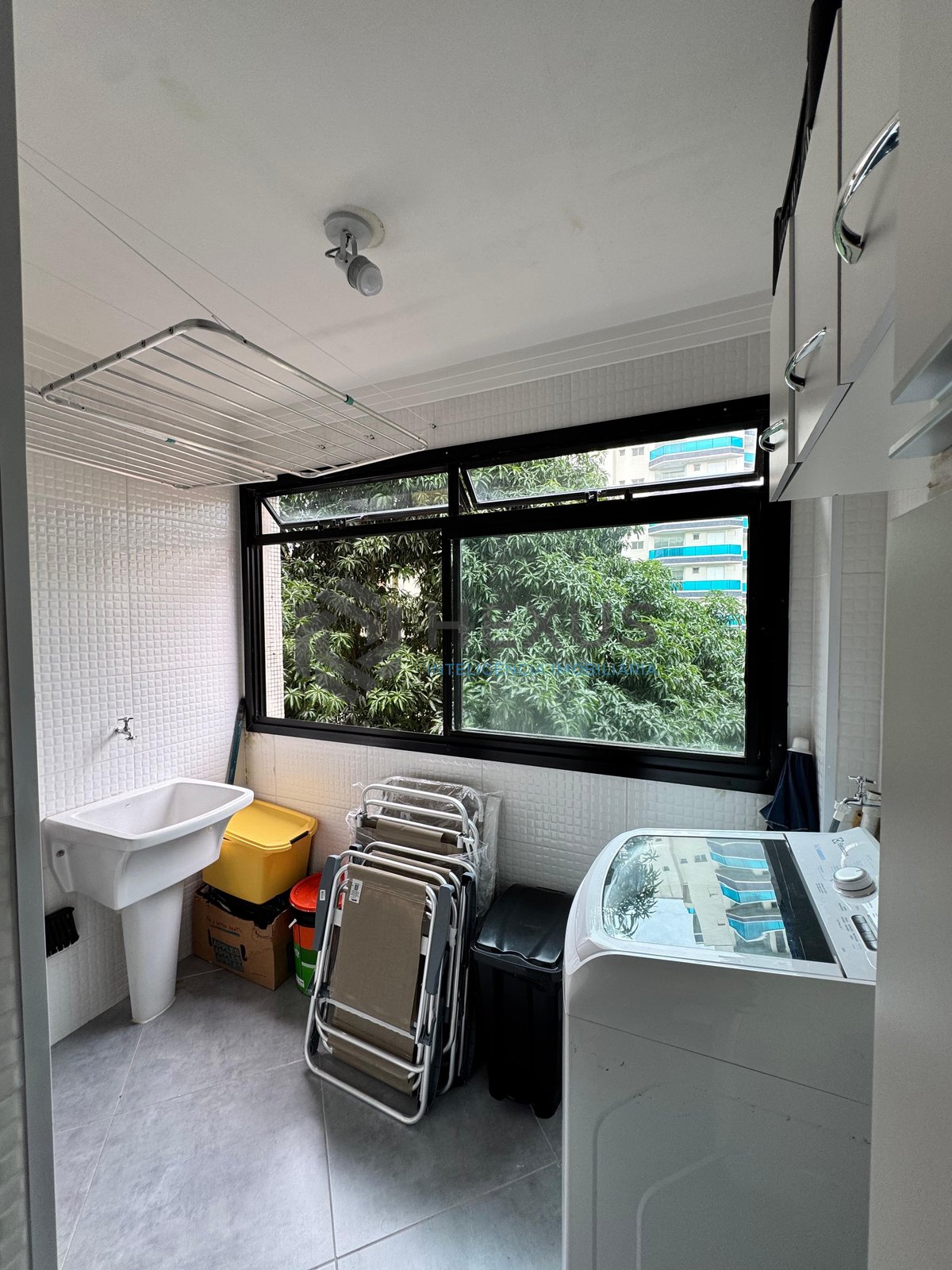 Foto 24 de Apartamento reformado com varanda na Praia das Astúrias, Guarujá