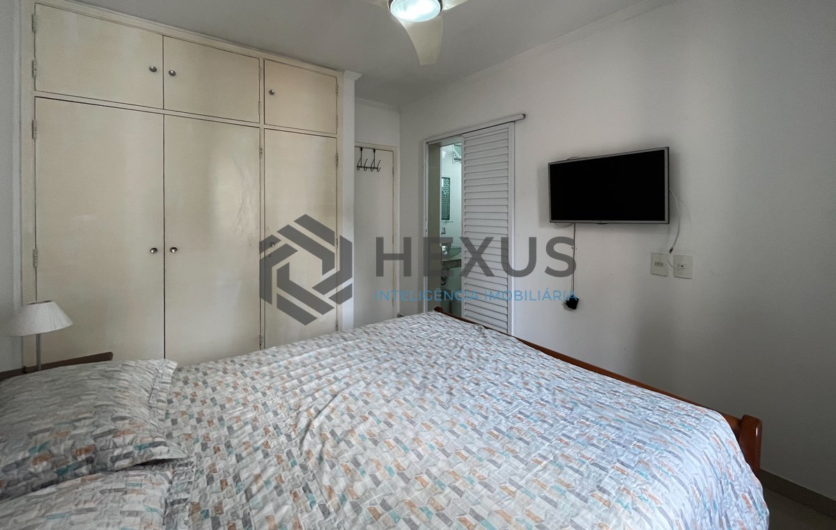 Foto 9 de Apartamento reformado com varanda a uma quadra da praia em Pitangueiras, Guarujá