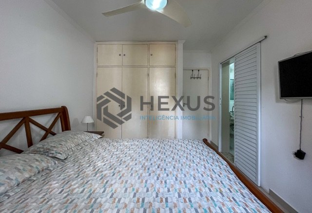 Foto 10 de Apartamento reformado com varanda a uma quadra da praia em Pitangueiras, Guarujá