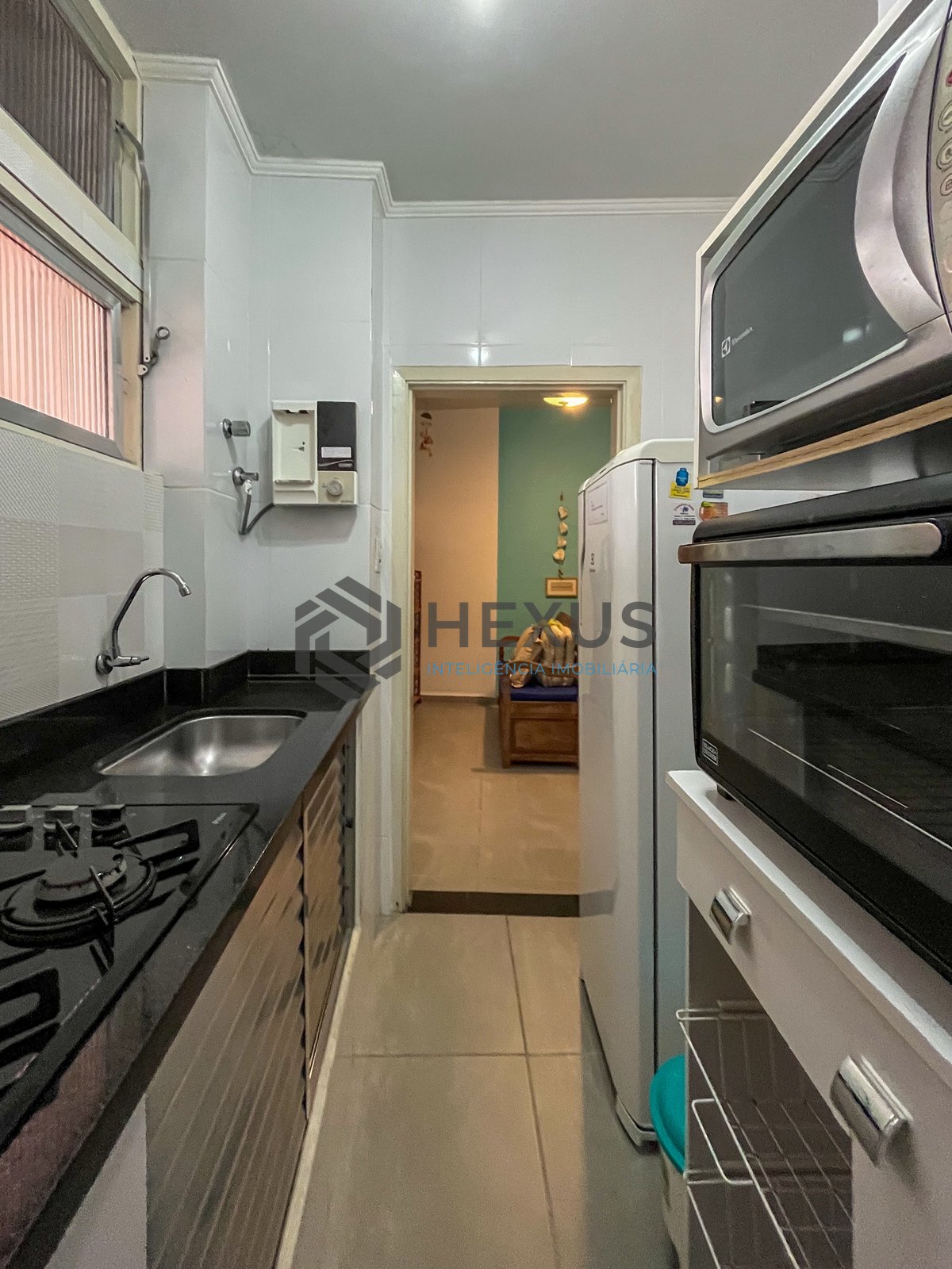 Foto 19 de Apartamento com vista mar a 50m da praia nas Pitangueiras, Guarujá