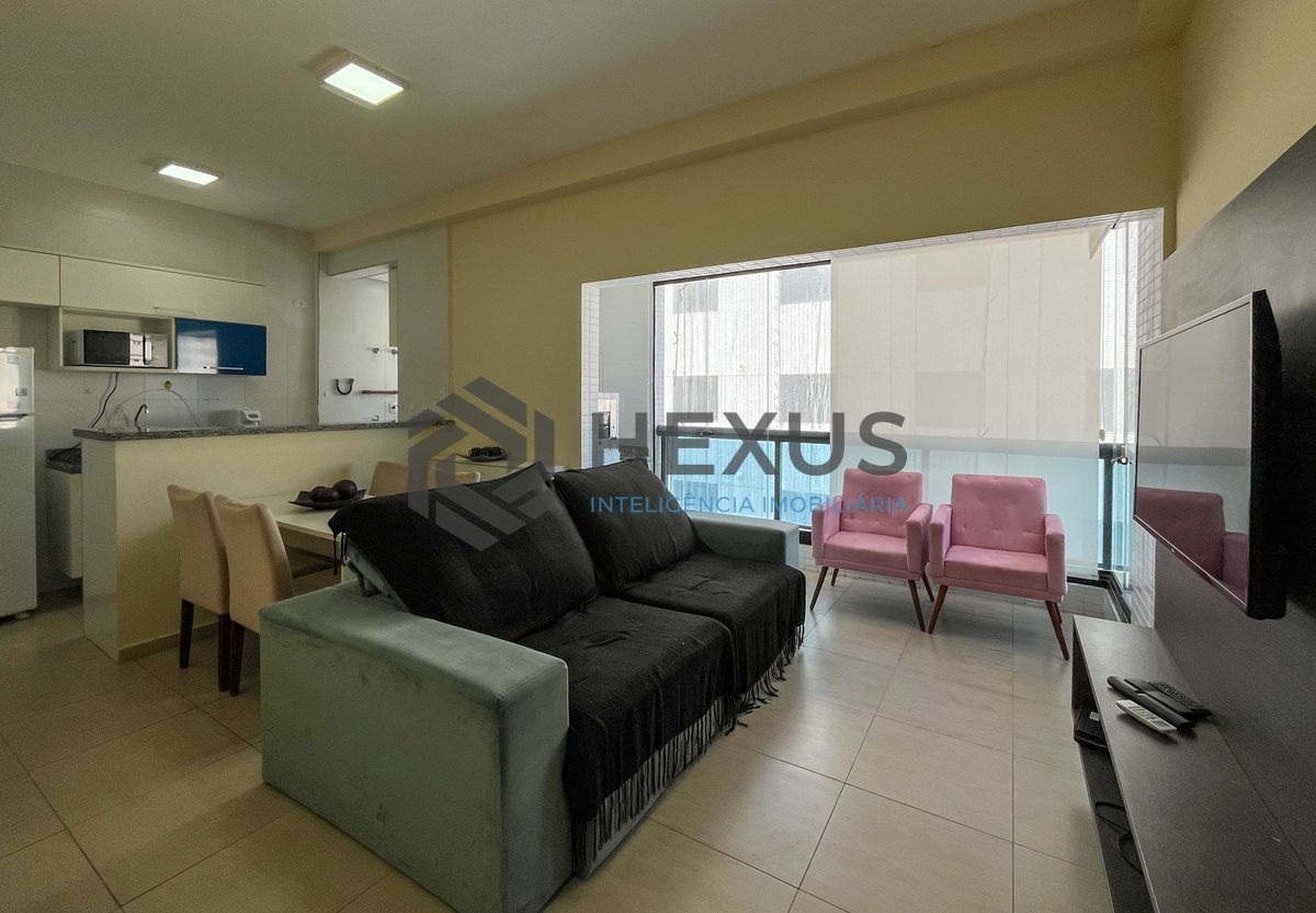 Foto 3 de Flat reformado com varanda gourmet e lazer na Pitangueiras, Guarujá