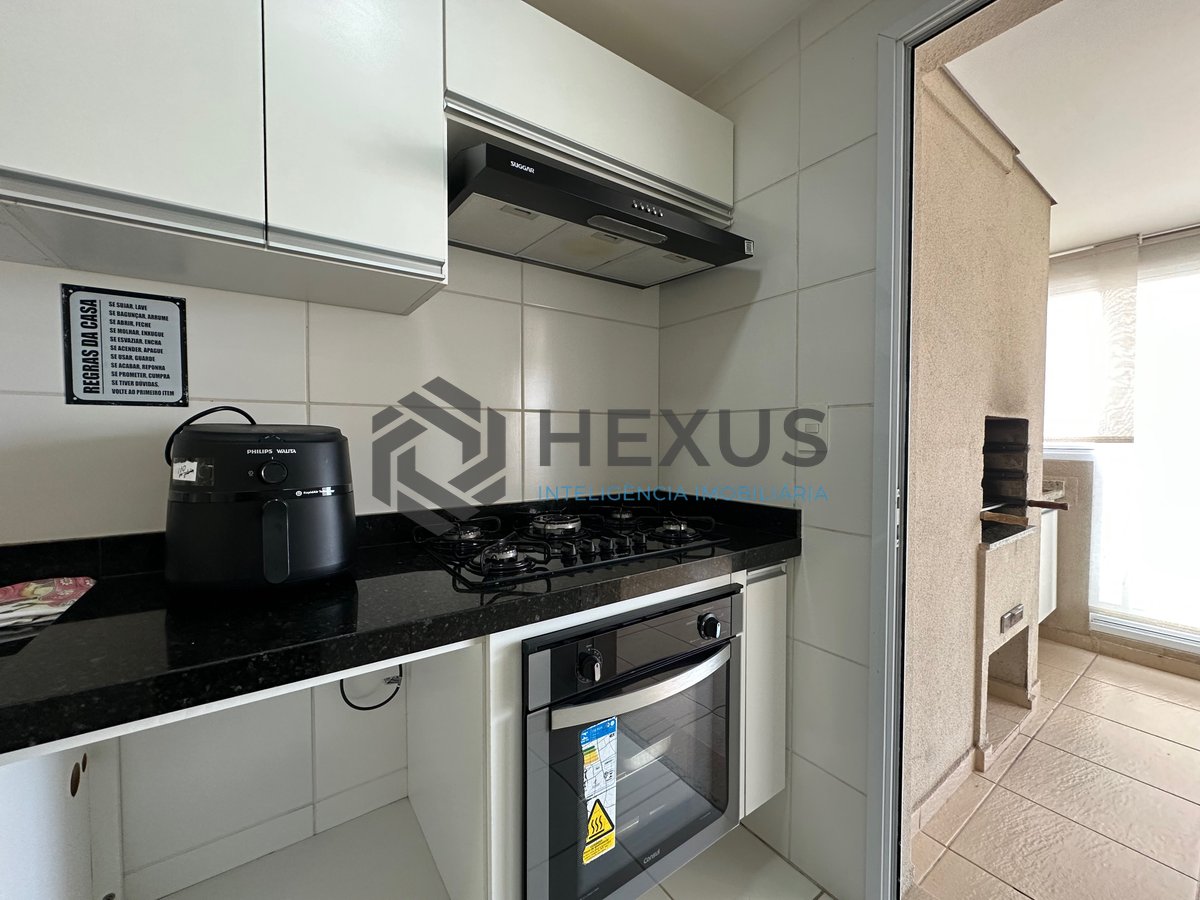 Foto 6 de Apartamento com varanda gourmet e vista mar a 600m da praia na Enseada, Guarujá