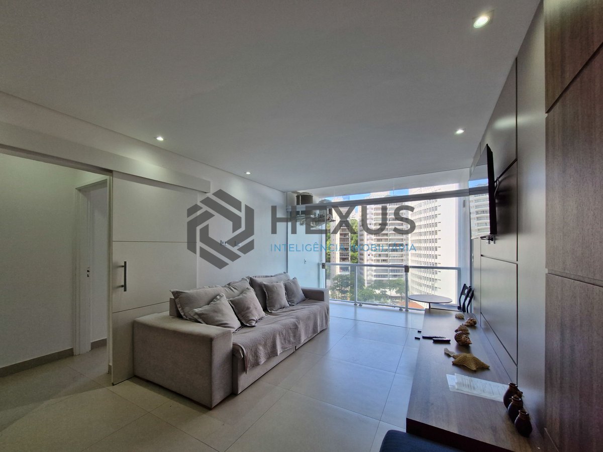 Foto 5 de Apartamento reformado frente mar com varanda e lazer nas Pitangueiras, Guarujá