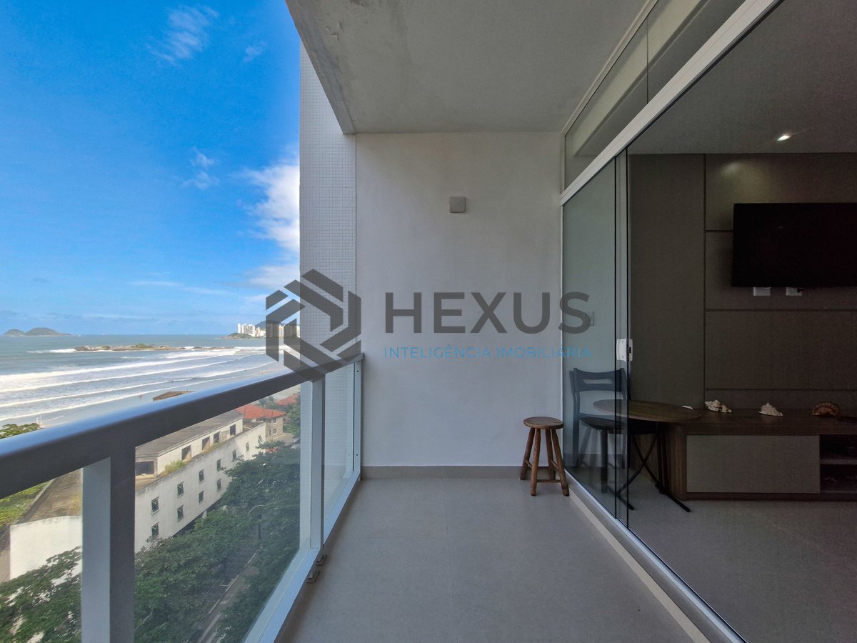 Foto 10 de Apartamento reformado frente mar com varanda e lazer nas Pitangueiras, Guarujá