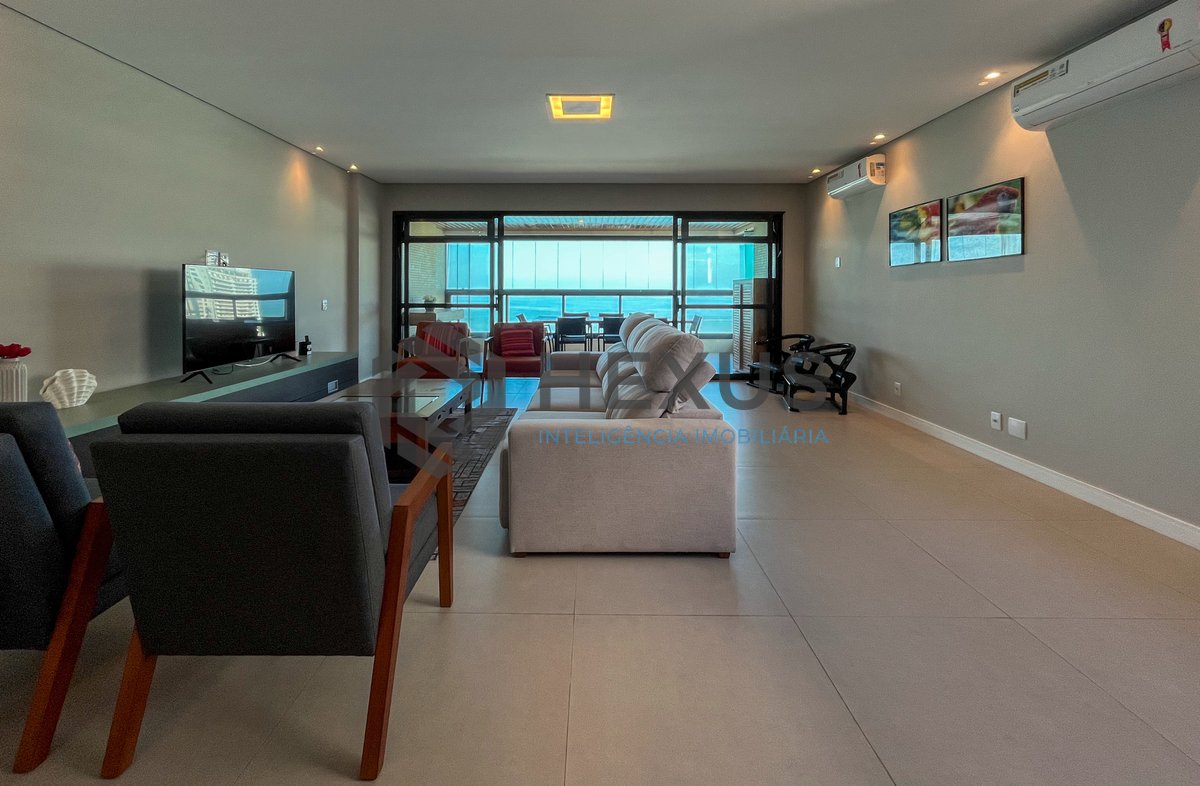 Foto 4 de Apartamento frente mar com varanda e lazer no Jardim Astúrias, Guarujá