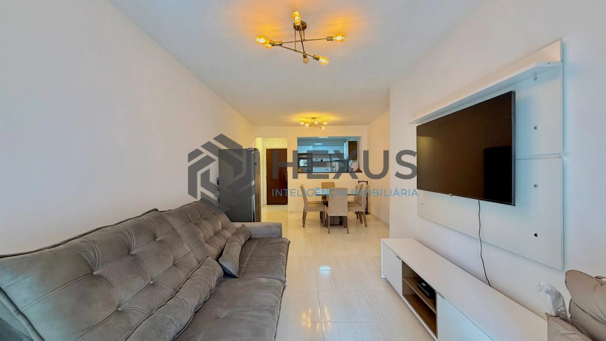 Foto 2 de Apartamento com varanda e lazer a 200m da praia nas Pitangueiras, Guarujá