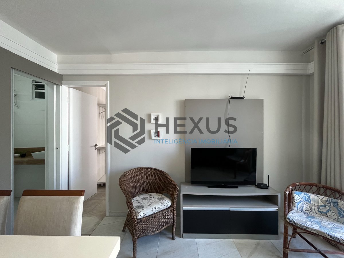 Foto 6 de Apartamento reformado com varanda vista mar na beira mar da praia nas Pitangueiras, Guarujá