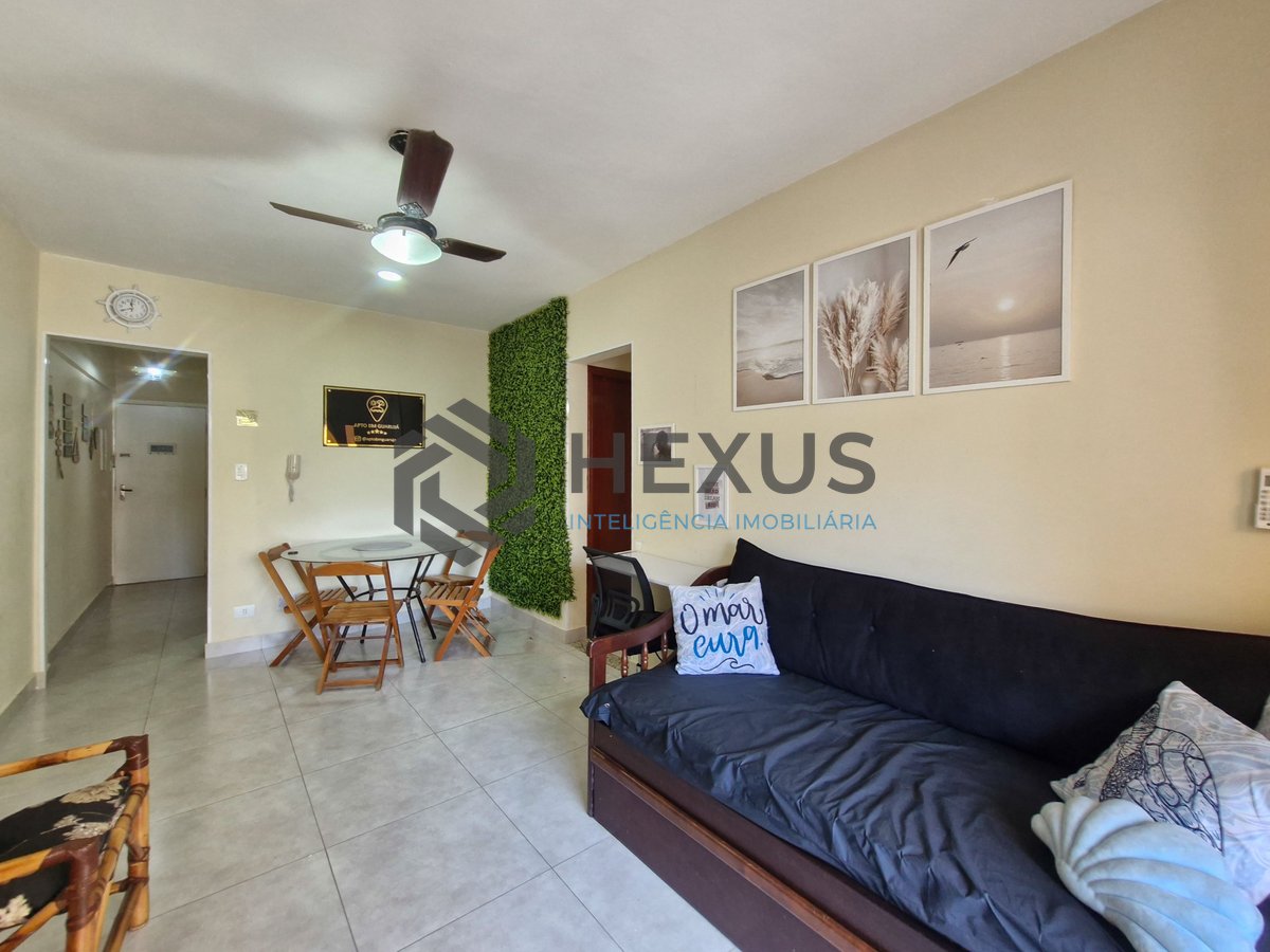 Foto 4 de Apartamento com varanda na quadra mar da praia nas Pitangueiras, Guarujá