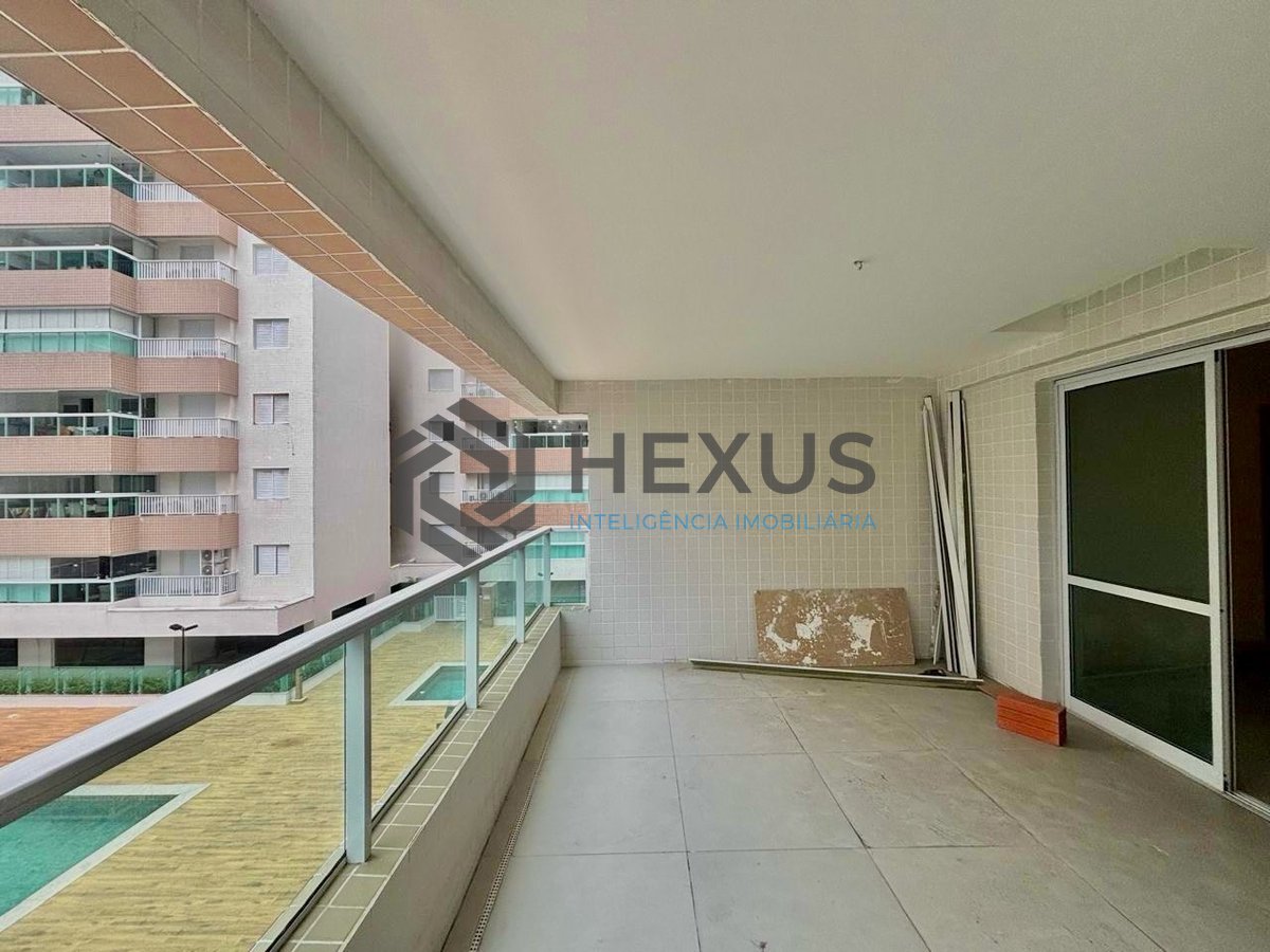 Foto 3 de Apartamento reformado com varanda gourmet vista mar com lazer a 1 quadra da praia no Jardim Astúrias à venda, Guarujá-SP.